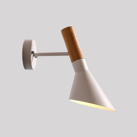 Stylish white wall light by resthouse