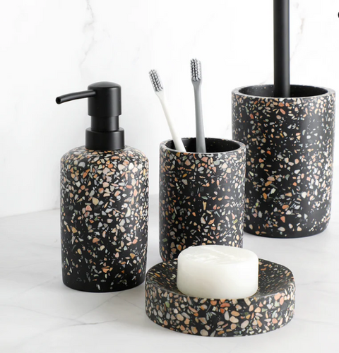 Black terrazzo accessories create captivating visual focal points in your bathroom.