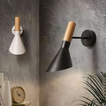 White and black elegant looking wall light by resthouse